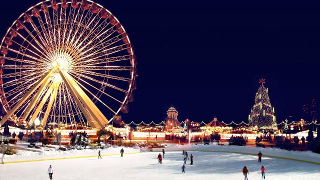 Observation wheel and ice rink in London at Christmas