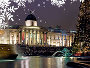 A gathering of Carol Singers in front of the Christmas Tree in Trafalgar Square. Photo by David Iliff, via wikicommons