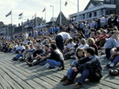 Crowd watches the Boat Race in Putney. Image Copyright Britain On View