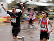 Runners make their way down the finish line at the Flora London Marathon. Copyright onEdition 2008