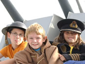 Kids onboard HMS Belfast. Copyright HMS Belfast