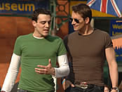 Two men enjoying shopping in Covent Garden, London