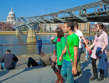 Group walking on London's South Bank with St Paul's Cathedral in the background