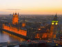 Aerial view of the River Thames, Houses of Parliament and Westminster Bridge at dusk. Copyright visitlondonimages/ britainonview/ Pawel Libera