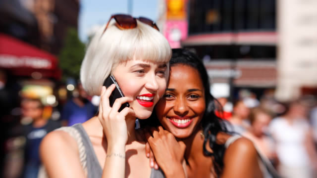 Tourists using a mobile in London