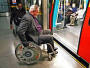 A wheelchair user on the tube