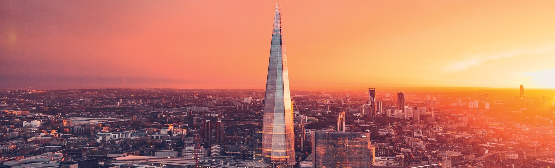 Aerial view of London during a sunset with the Shard at the centre