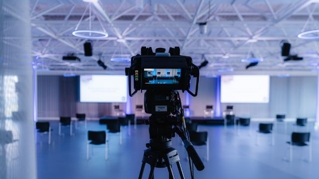 Close up of a studio camera set up in the centre with the screen facing the viewer at the Science Museum.