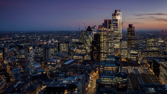 A night-time view of the City of London skyline