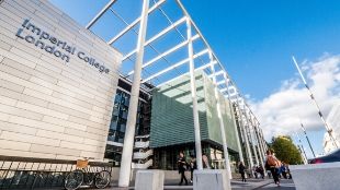Imerial College London building entrance with blue skies showing