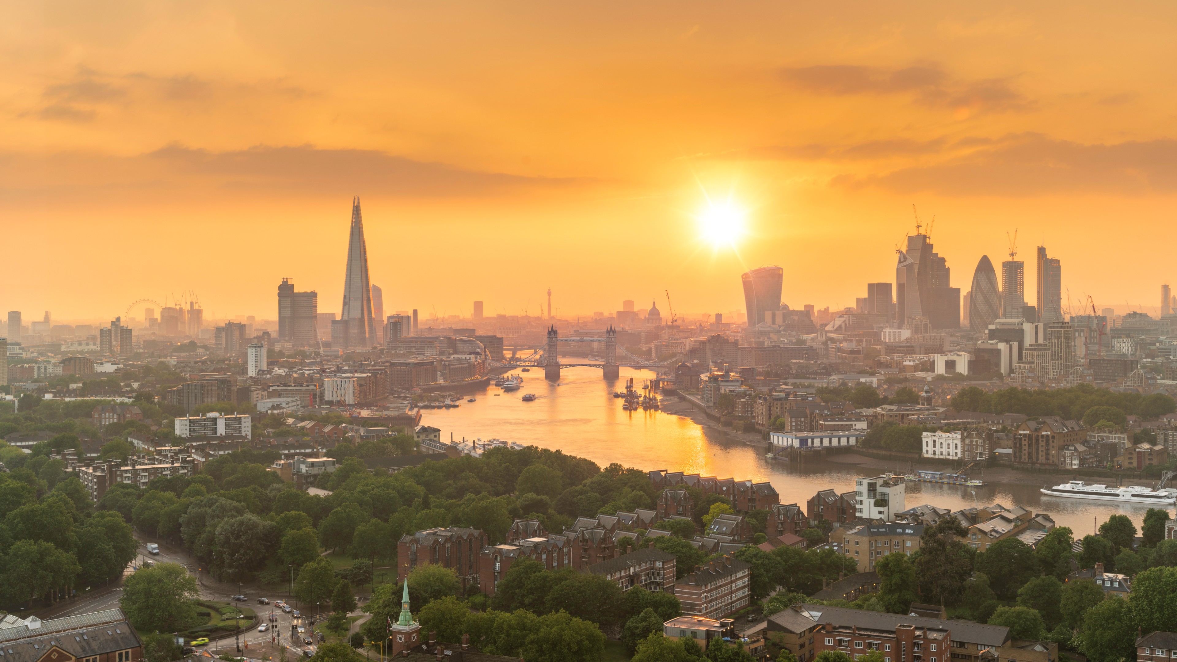 Sunset over London showing the River Thames and the city skyline
