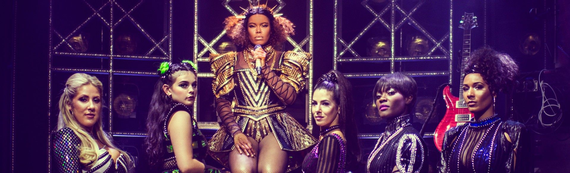 Henry VIII's six wives perform on stage in Six The Musical