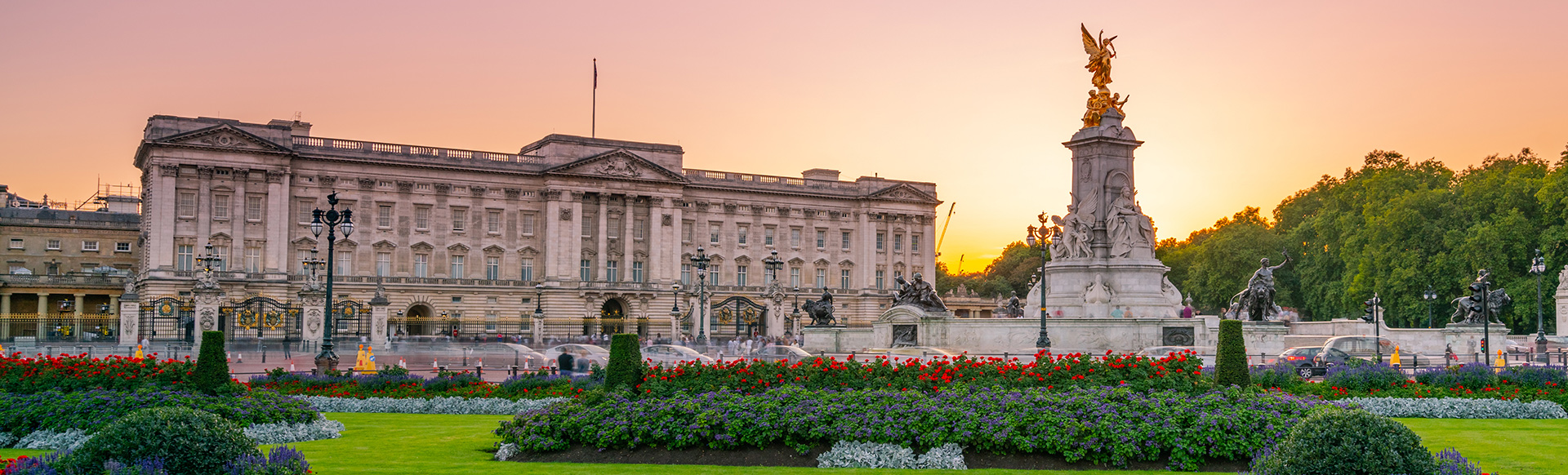 Buckingham Palace and memorial garden at sunset