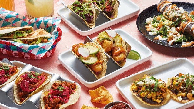 Selection of Mexican street food from Wahaca, including tacos, quesadillas and vegetables.