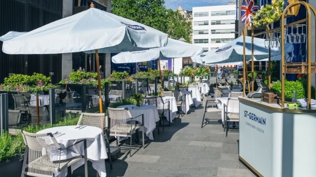 The elegant sunny terrace at London's popular restaurant Whitcomb's