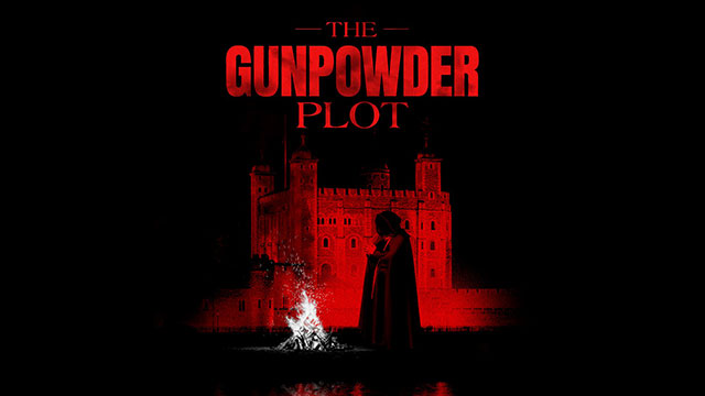 A shadow figure in a hooded black cloak standing in front of the Tower of London, lit up by red lights on a dark night with a white bonfire in front of him