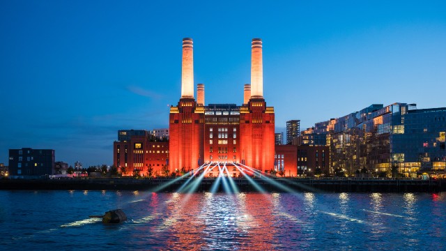 Battersea Power Station lit up in red in celebration of its reopening. 