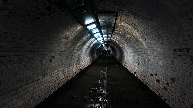 The dark Greenwich Foot Tunnel