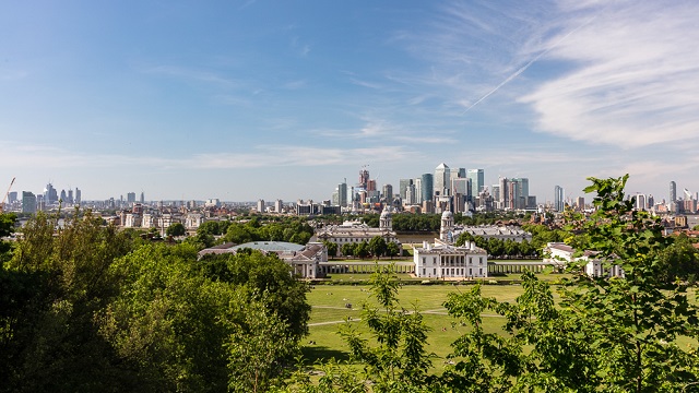 The view from Greenwich Park featuring the Old Royal Naval College and Canary Wharf.