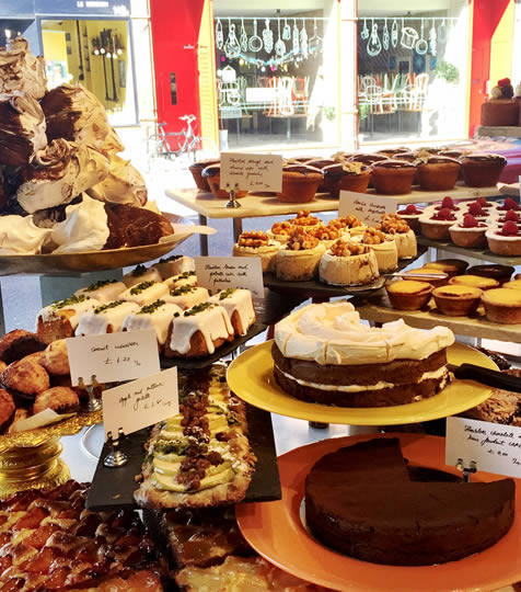 Window display of cakes and pastries at Ottolenghi in Islington