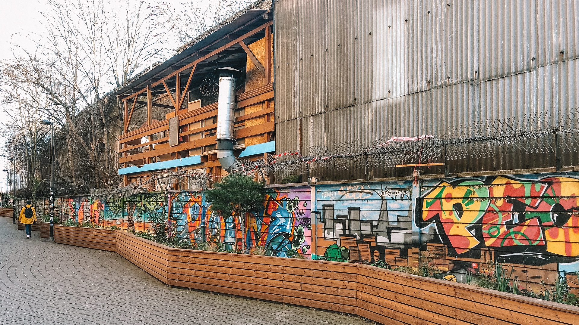 street art in Peckham by corrugated iron building