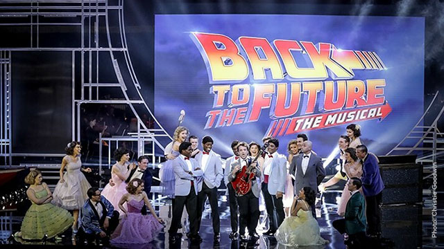 The cast from Back to the Future on stage at the Oliver Awards collecting an award