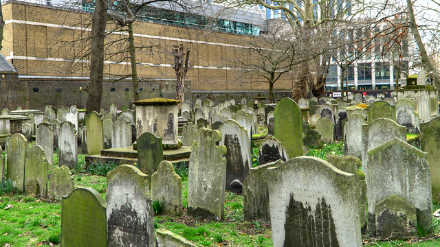 Gravestones covered in moss at Bunhill Fields, London