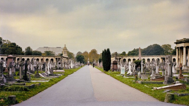 A view down the Ceremonial Axis with memorials and gravestones standing either side of the central walkway.