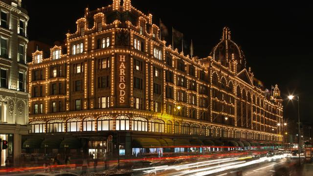 Harrods department store lit up at night