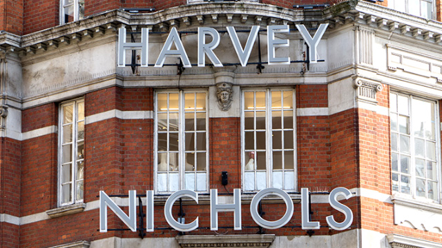 Exterior signage on a brick building at Harvey Nichols department store in London