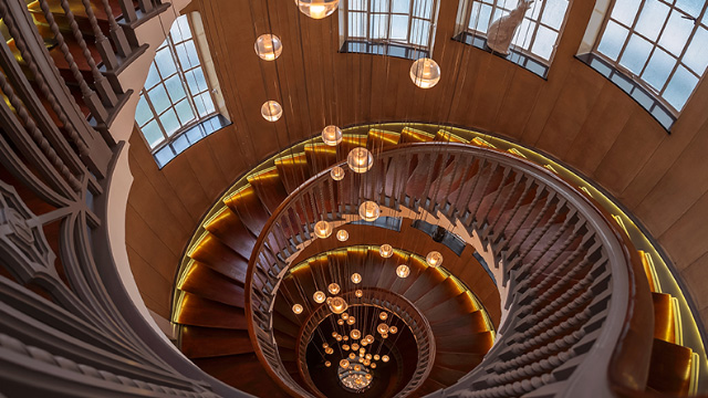 Spiral staircase and chandelier at Heal's department store in London