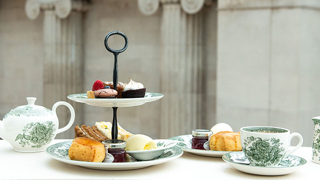 An afternoon tea with selection of scones, cakes, pastries and tea.