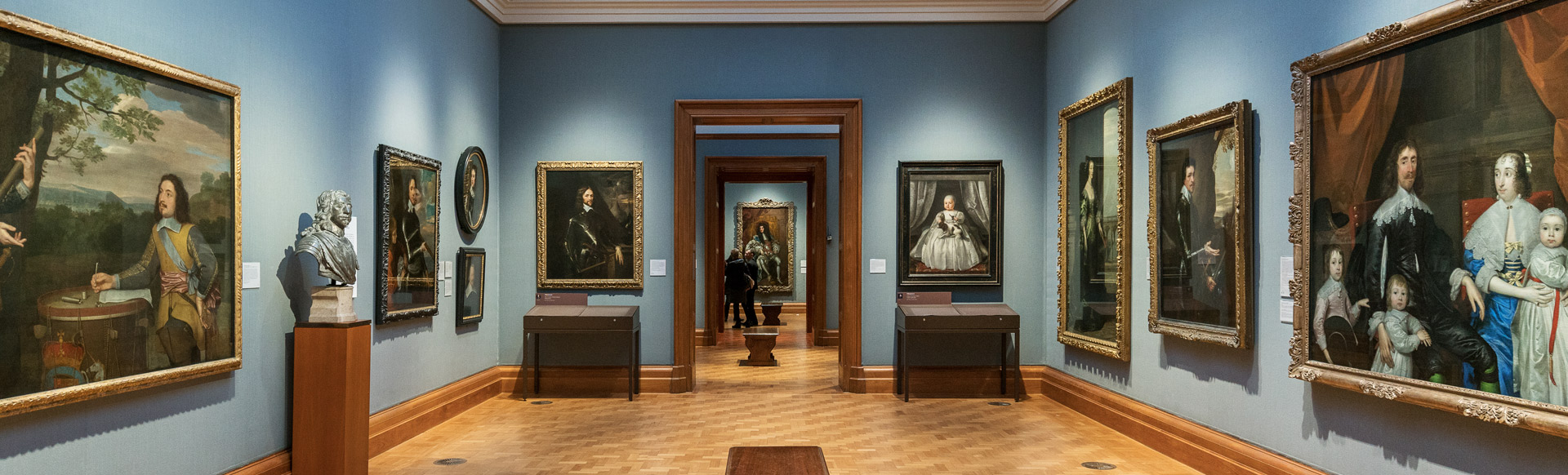 Interior of the National Portrait Gallery with paintings and sculptures.