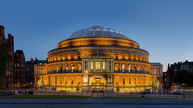 Exterior view of the Royal Albert Hall's North Entrance lit up at dusk