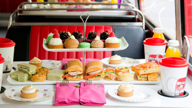 A colourful selection of cakes and sandwiches on Brigit's Bakery Afternoon Tea Bus Tour