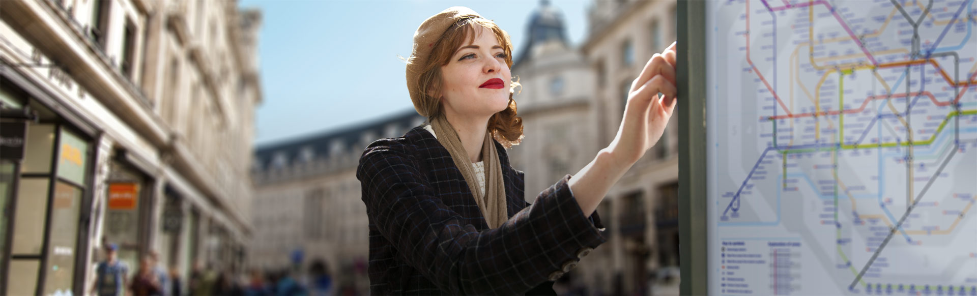 Woman reading a London map in Regent Street