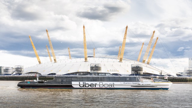 The Jupiter clipper operated by Uber Boat by Thames Clippers sails past The O2.