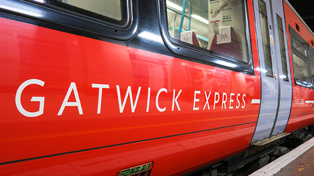 The side of a train with Gatwick Express branding 
