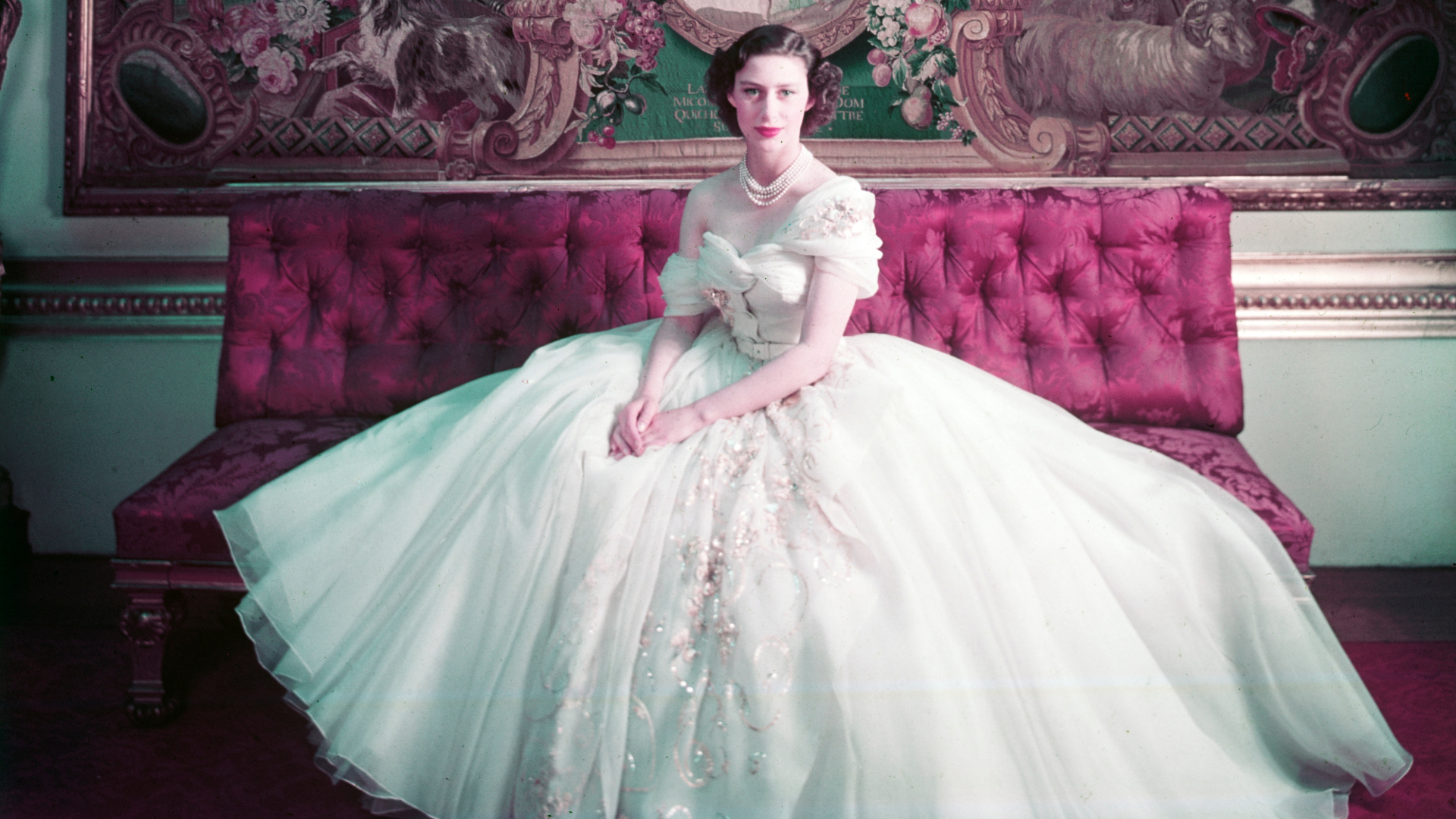 Photograph of Princess Margaret wearing a white Dior gown as part of the Christian Dior: Designer of Dreams exhibition at the V&A