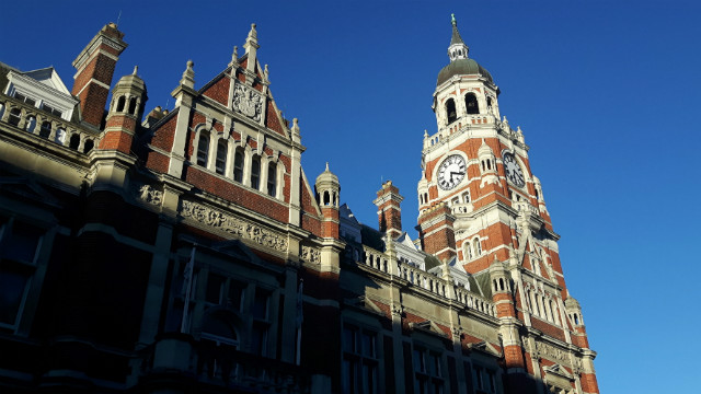 Croydon Clocktower with bright blue sky in the background.