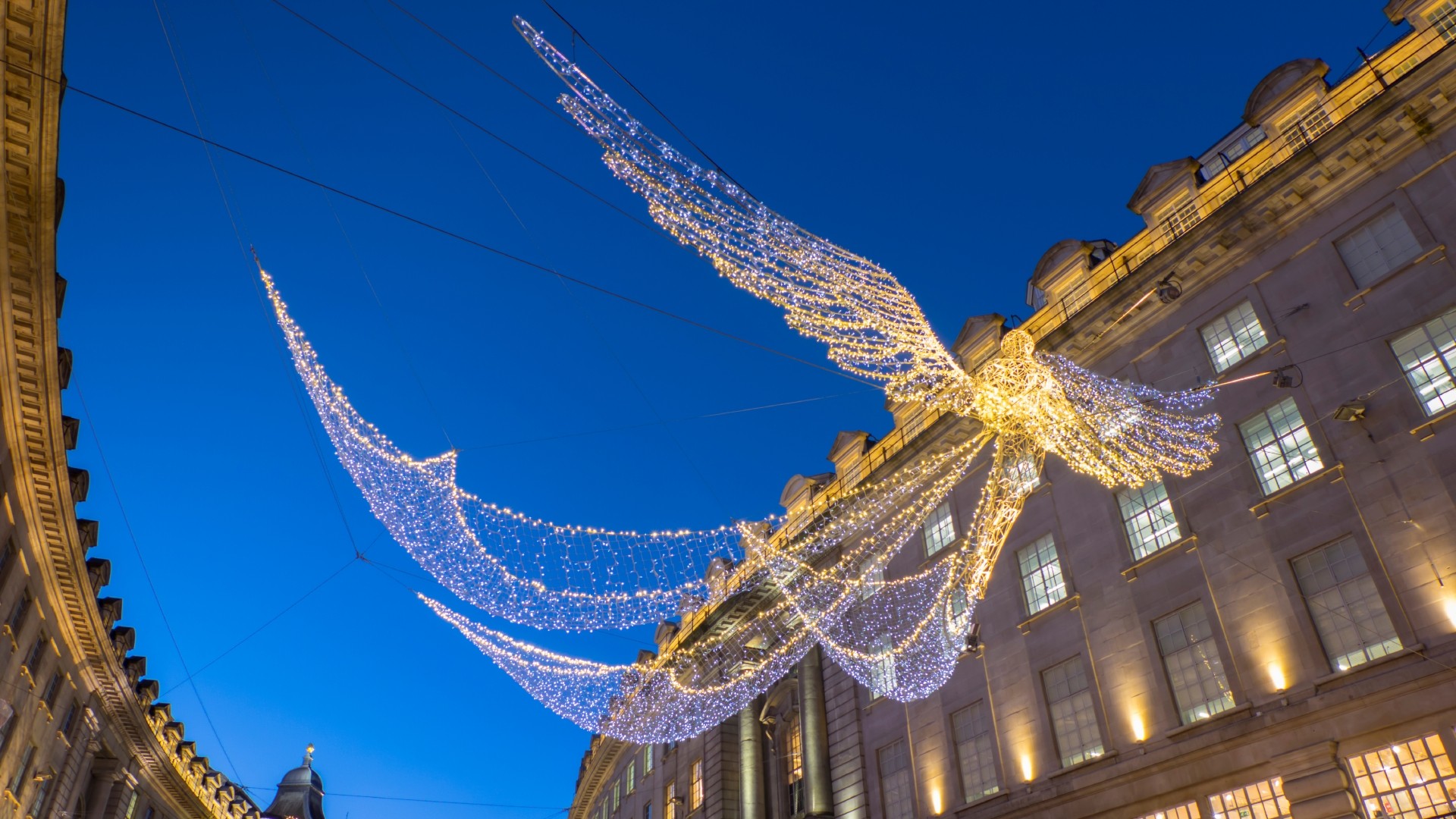 Angel-like Christmas decorations lighting up Regent Street.