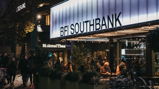 Lit-up exterior of BFI Southbank at night in London