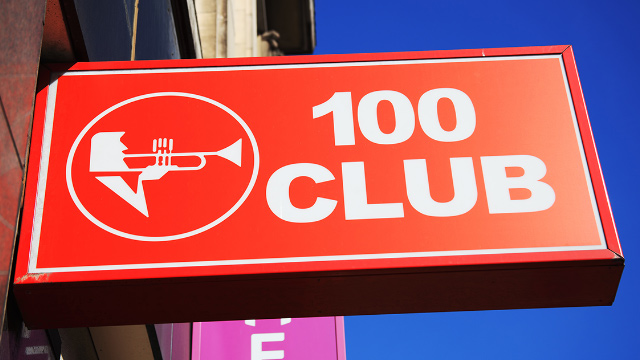 The red sign of the 100 Club on London's Oxford Street.