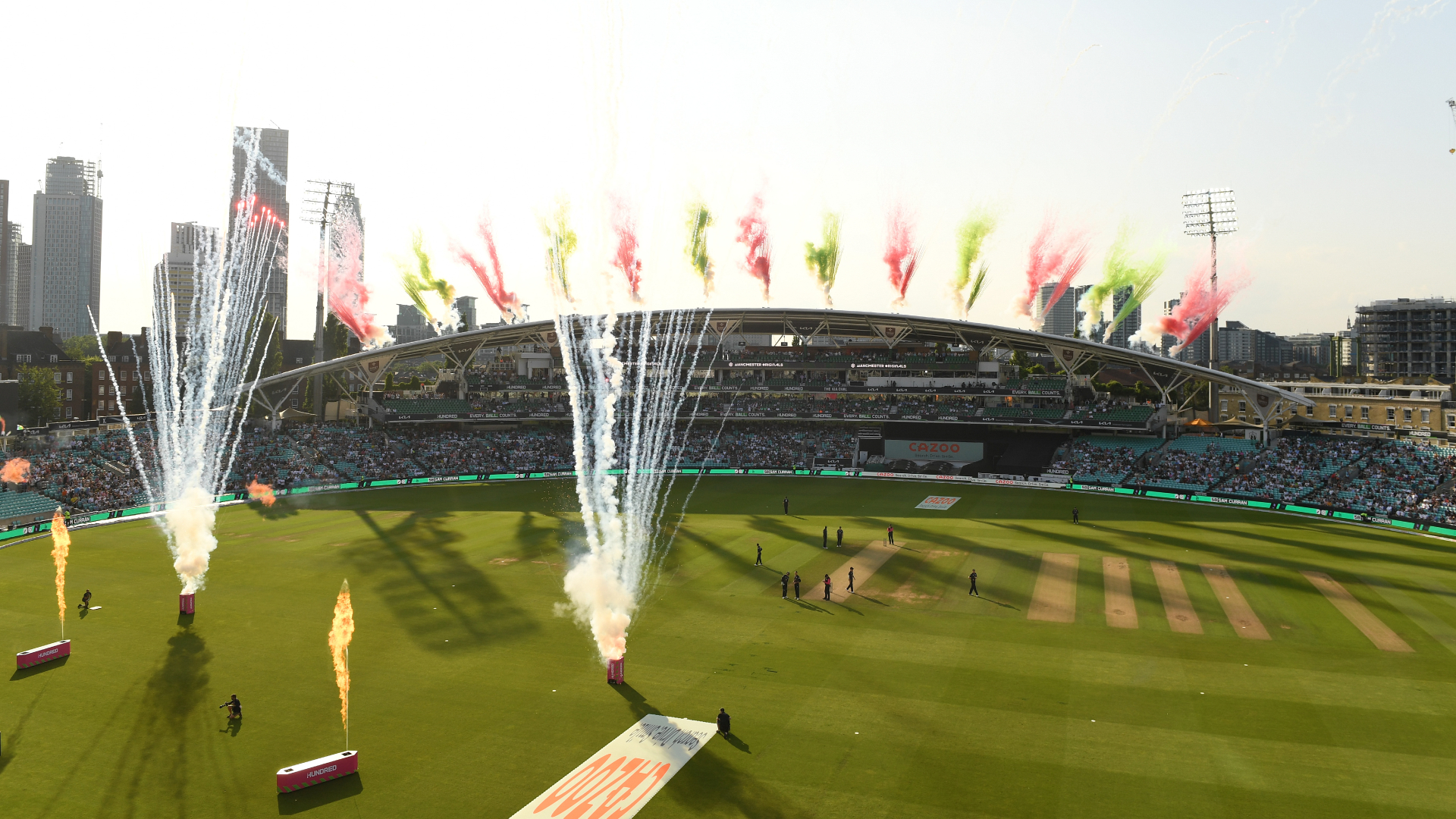Colourful fireworks shoot off from the pitch and The Kia Oval stand to celebrate the first Hundred tournament in 2021.