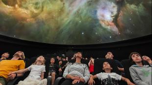 Inside a show at the Peter Harrison Planetarium. Image courtesy of Royal Museums Greenwich.