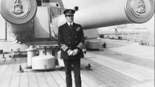 Admiral of the Fleet, Sir David Beatty standing between the guns of 'Y' turret on the quarterdeck of his flagship HMS Queen Elizabeth. © National Maritime Museum, London