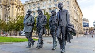 The Beatles statue in Liverpool. Photo by Neil Martin on Unsplash.