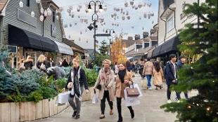 Shoppers enjoy some retail therapy in Bicester Village. Image courtesy of Golden Tours.