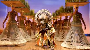 Watch Mufasa on the stage. Image courtesy of Disney The Lion King.