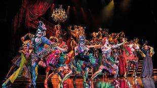 Discover the production of the Phantom of the Opera in a multitude of colourful costumes at Her Majesty's Theatre. Image courtesy of SEE Tickets.